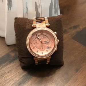 Michael Kors women’s watch rose gold and cheetah.